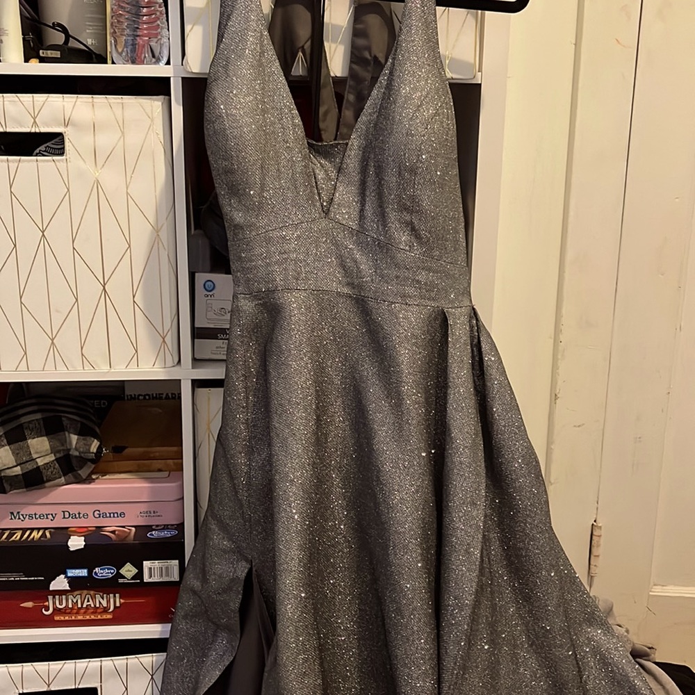 Selling old prom dress. Trying to get some money for the bills. Interested?